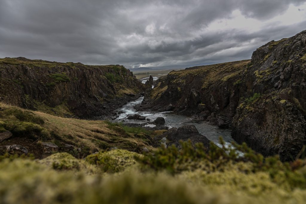 Aerial Photography of River Between Cliffs